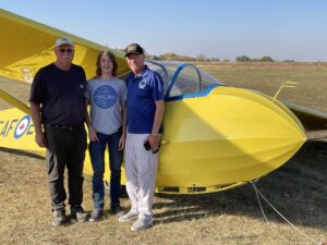 14-year-old Liam S, standing between his dad Bill and CFIG Dan P, after Liam's first solo.